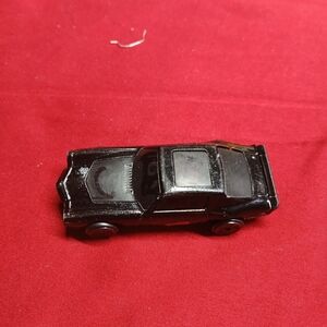 black Kidco Burnin' Key Car, a vintage toy popular in the 1980s.